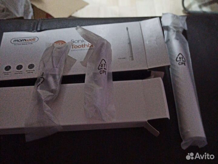 Электронная зубная щетка