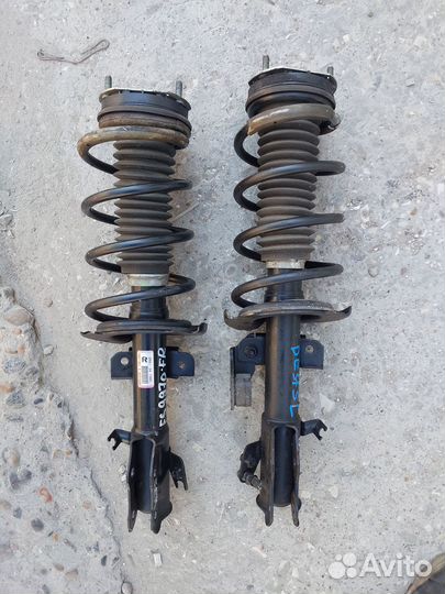 Стойка,амортизатор передний мазда демио,мазда 2