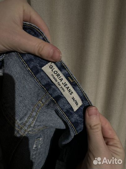 Джинсы женские с высокой талией раслешенные