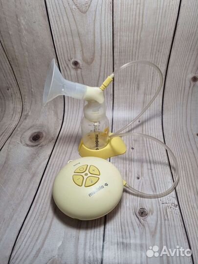 Молокоотсос medela swing электрический