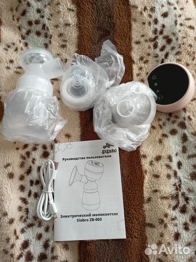 Электрический молокоотсос