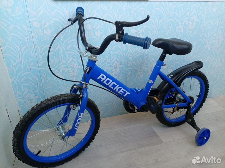 Четырехколесный велосипед