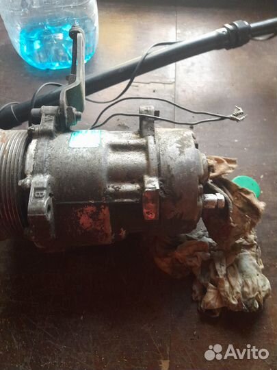 Компрессор кондиционера вольво460