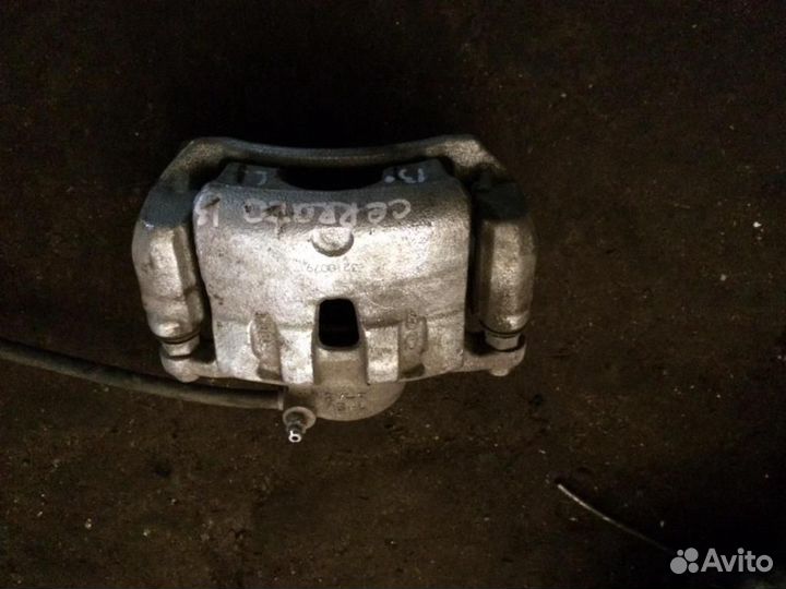 Суппорт передний левый KIA Cerato 2013-2020