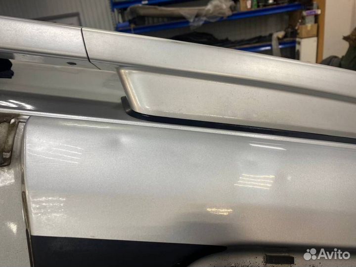 Б/У Крыло заднее левое 7742300Q1F nissan