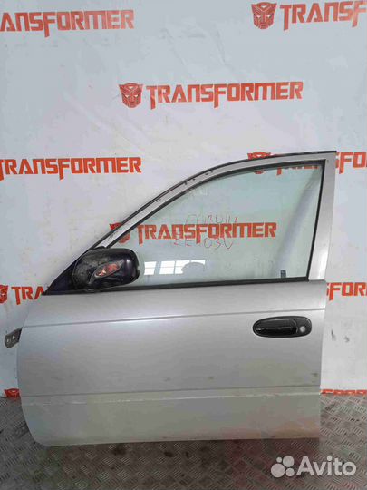 Стекло двери левое переднее Toyota Corolla EE103V