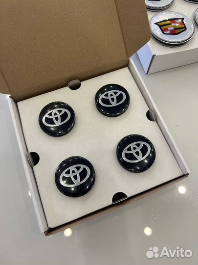 Центральные кинетические колпачки для дисков авто