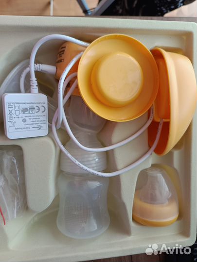 Продам электрический молокоотсос maman
