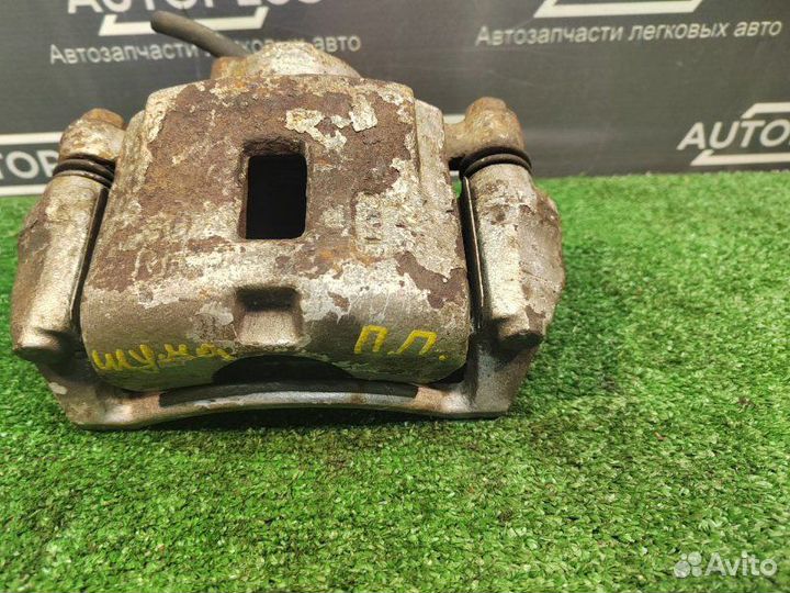 Суппорт передний правый Kia Shuma 2 седан 1.6 S6D