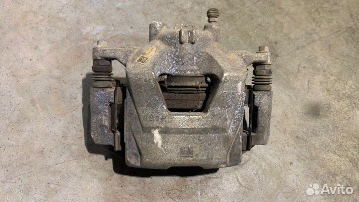 Суппорт тормозной передний левый Chevrolet Cruze