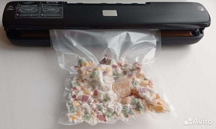 Вакуумный упаковщик