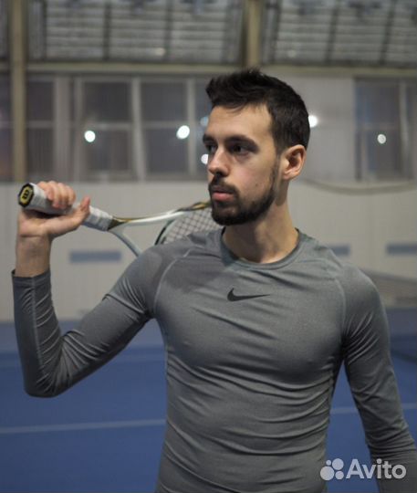 Тренер по большому теннису