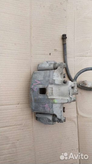 Суппорт передний правый Mitsubishi Lancer lX