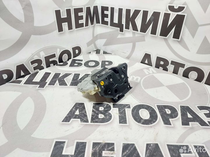 Замок двери задний левый Volkswagen Passat B6