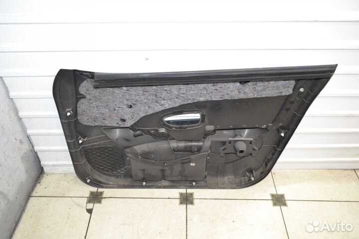 Обшивка двери передняя левая Nissan Almera G15