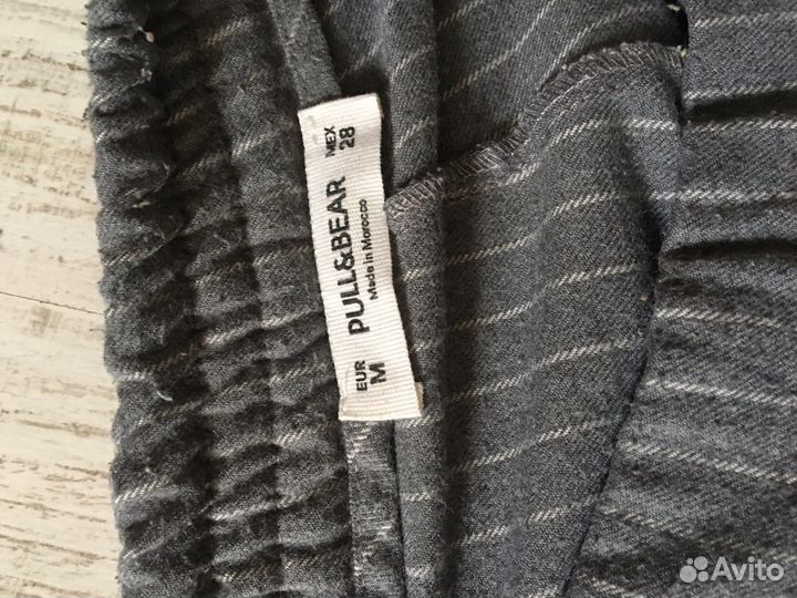 Штаны в вертикальную полоску