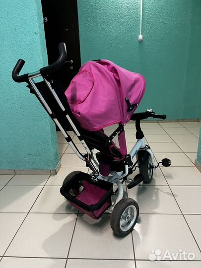 Трехколесный велосипед с ручкой