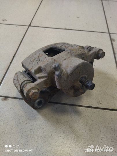 Суппорт тормозной передний левый Chevrolet Lacetti