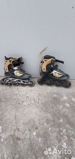 Коньки роликовые