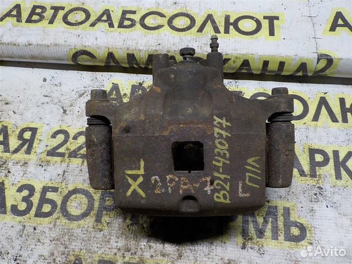 Суппорт передний левый Mitsubishi Outlander XL (C