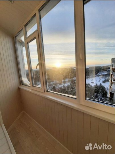 Остекление балкона с отделкой