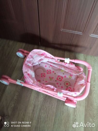 Коляска кукольная