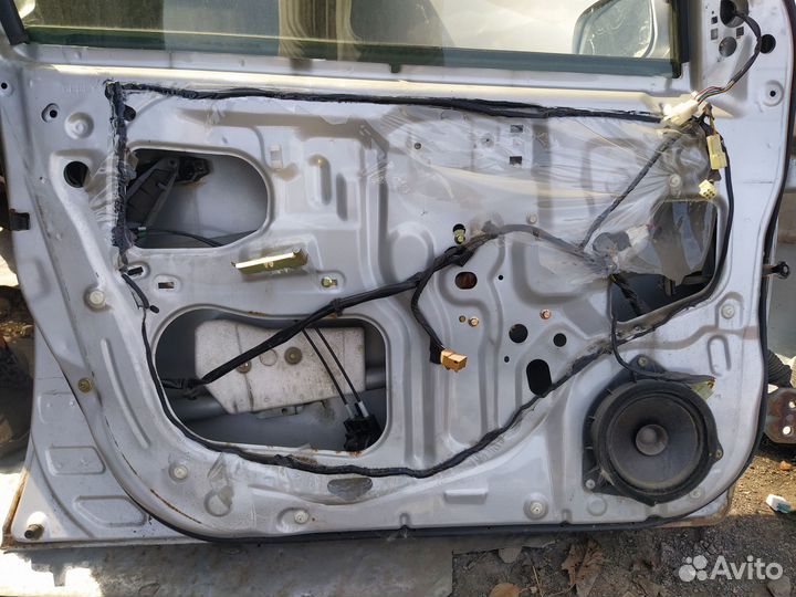 Дверь передняя левая Geely MK Cross