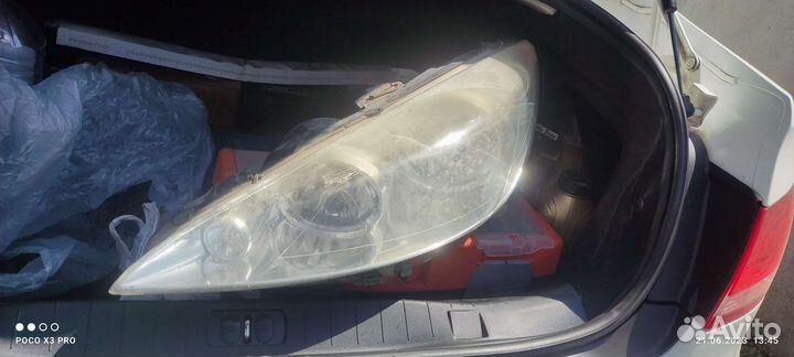 Фара левая Peugeot 408