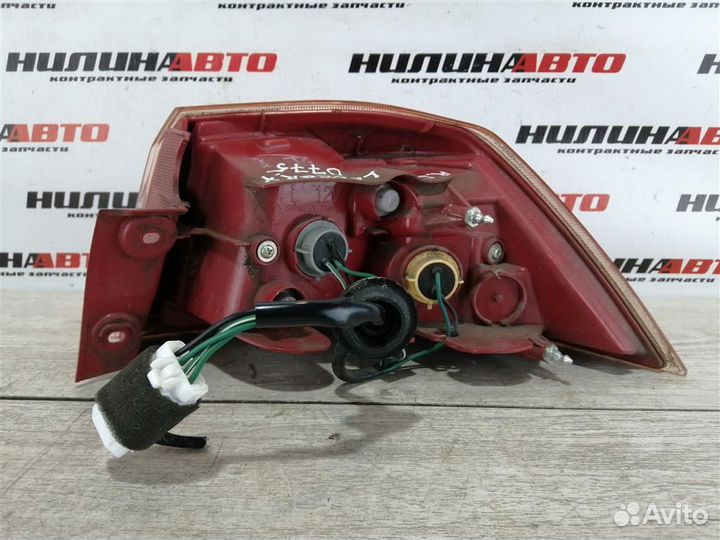 Фонарь левый Митсубиси Лансер 10