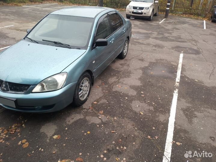 Mitsubishi Lancer 1.3 МТ, 2006, 402 610 км