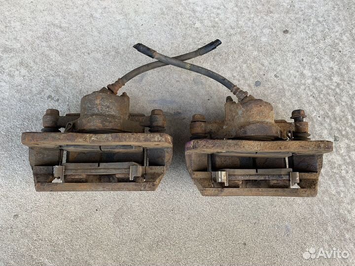 Суппорт передний Kia Spectra