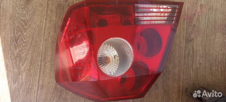 Задний правый фонарь на джили мк седан