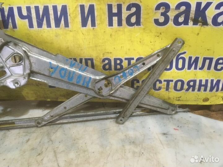 Стеклоподъемник электр. передний левый Honda Logo