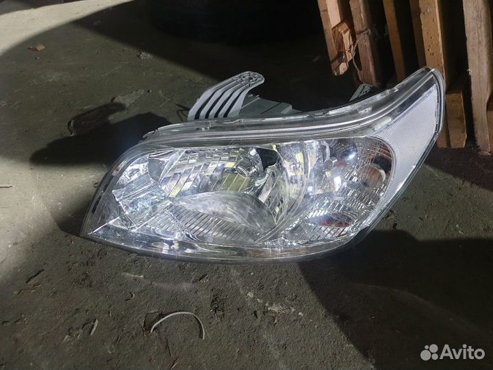 Фара левая Chevrolet Aveo (T250)