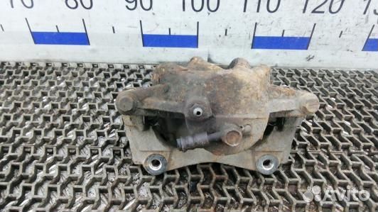 Суппорт тормозной передний левый toyota corolla ve