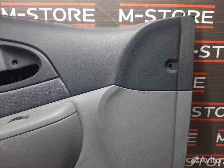 Обшивка двери передняя левая Toyota Funcargo NCP20