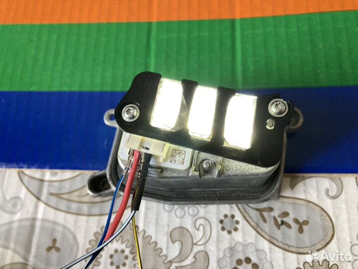 761998477A Touareg Правый модуль в фару дхо