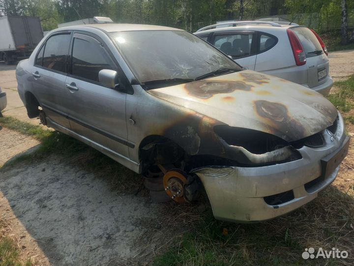 Запчасти лансер 9