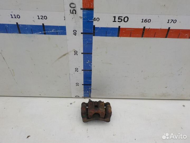 Суппорт тормозной задний левый Kia Cerato 2009