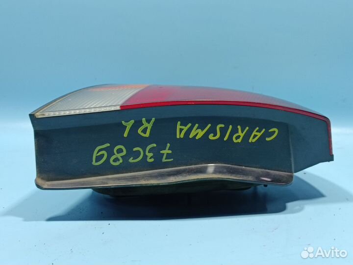 Фонарь левый наружный для Mitsubishi Carisma