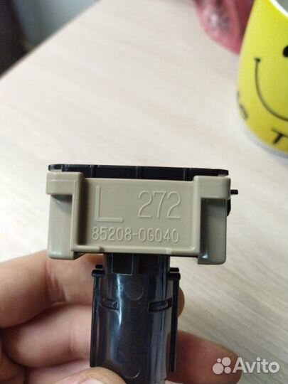 Форсунка омывателя фары передняя левая Toyota Land