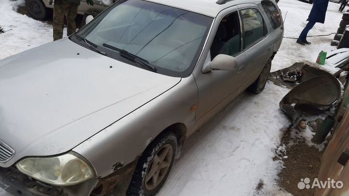 Запчасти для Kia Clarus универсал, 1999 год