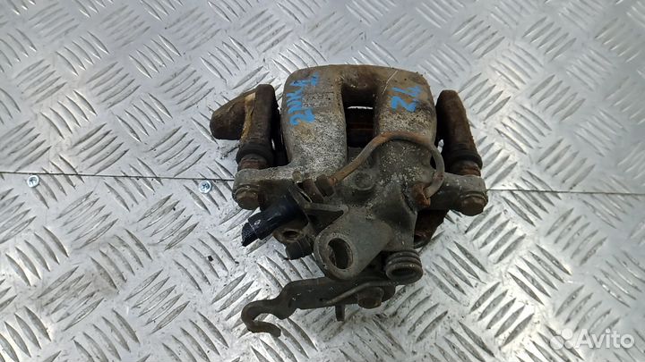 Суппорт тормозной задний левый Skoda Octavia