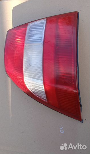 Фонарь левый Opel Vectra b