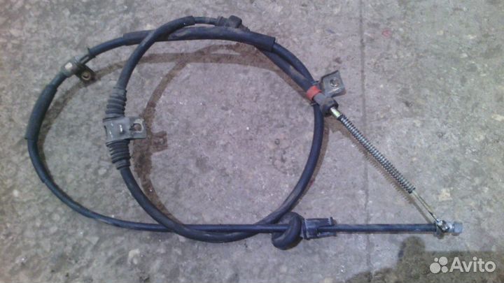 Трос ручника митсубиси аутлендер