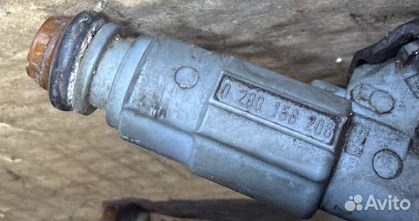 Форсунка топливная б/у Mazda 3, 5, 6