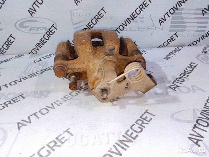 Суппорт тормозной задний левый Hyundai Solaris 1