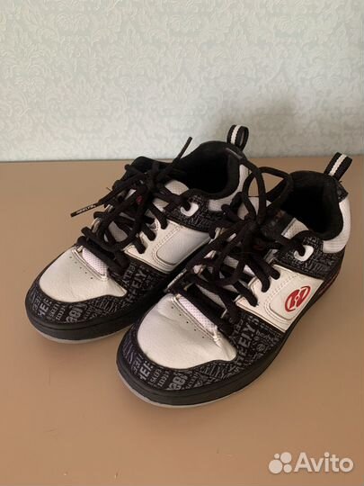 Кроссовки на роликах heelys