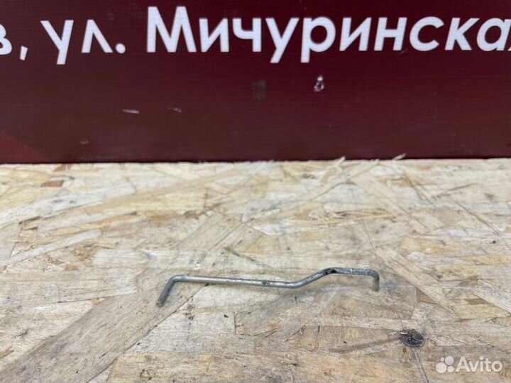 Тяга привода замка багажника Renault Logan