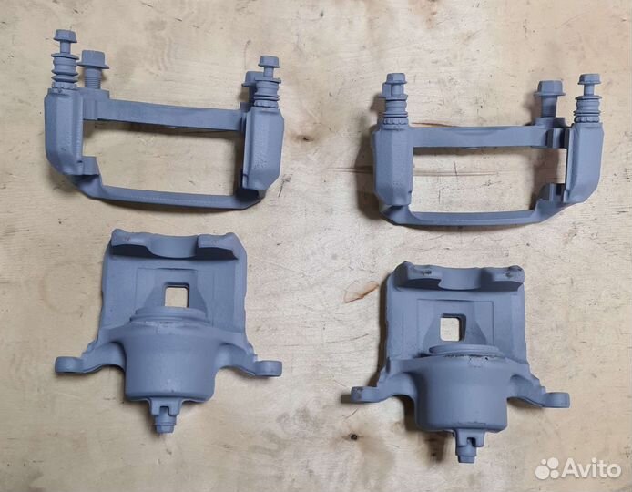 Суппорт тормозной передний Nissan